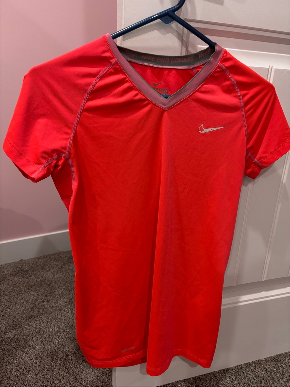 Nike women’s  hot pink Dri-FIT Short Sleeve Performance Shirt